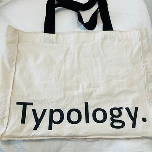 Typology Cream Tote Bag with Black Handles